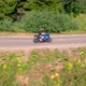 A Young Man Rides a Motorcycle Outside the City - VideoHive Item for Sale