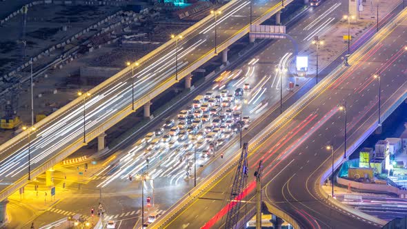 Night Traffic on a Busy Intersection at Dubai Downtown Highway Aerial Timelapse