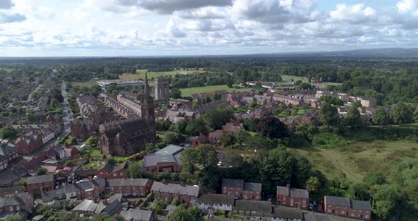 Aerial pull back shot from cathedral over Chester