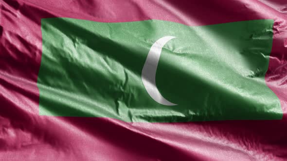 Maldives textile flag waving on the wind. Slow motion. 20 seconds loop.