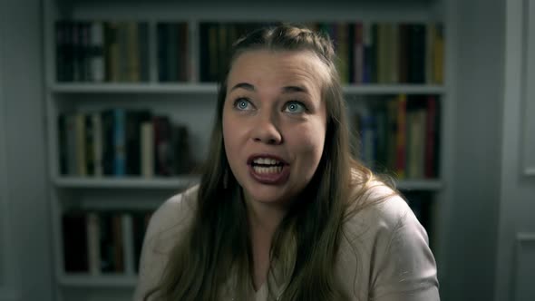 Portrait of Young Caucasian Woman Who is Talking and Gesturing Emotionally