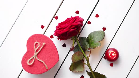 Fresh Red Rose Flower on the White Wooden Table