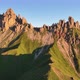 Dolomites mountains peaks with a hiking path on a summer sunrise - VideoHive Item for Sale