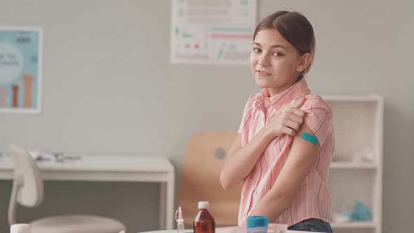 Portrait of Smiling Girl after Vaccination