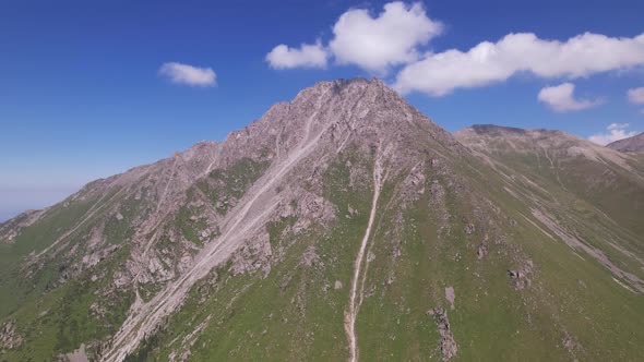 Clouds Flow Around the Tops of High Mountains