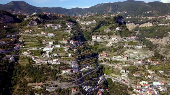 Italian Amalfi coastline terraces in the town of San Michele with homes and buildings on the ravine,