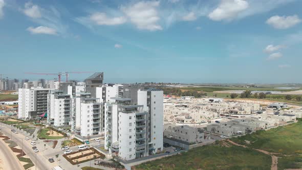 new neighborhood buildings with cranes at netivot city