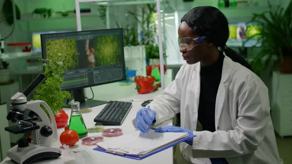 Scientists Researchers Working in Biotechnology Lab Looking at Vegan Food