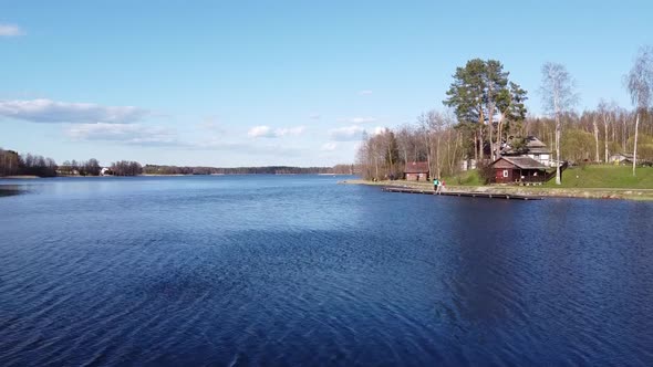 Aerial View of the Lake Borisovskoye, the Forest and the Settlement in Autumn Day, Borisovo