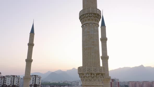 Traditional Mosque with Minaret Against Evening Sky