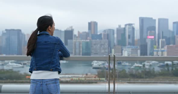 Woman Look at The City View in Hong Kong