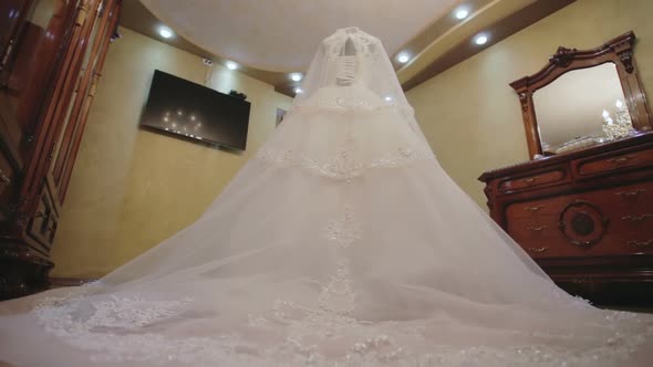 Wedding Dress on a Mannequin in a Room Rich People - Dolly Motion