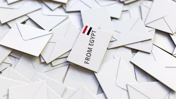 Letter with From Egypt Text on Pile of Other Letters alt