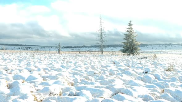 Low altitude ascending drone shot revealing beauty of winter moorland
