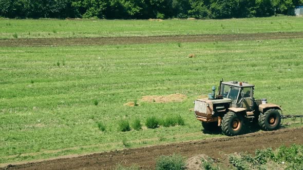 Tractor Preparing Land