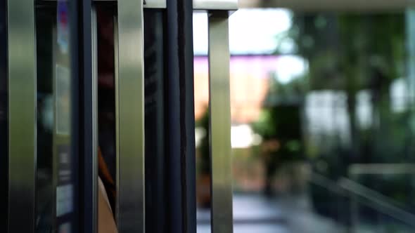 Young Asian Woman Wearing Face Mask While Leaving a Coffee Cafe Shop