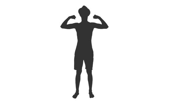 Silhouette of Young Bodybuilder Posing and Shows Muscles