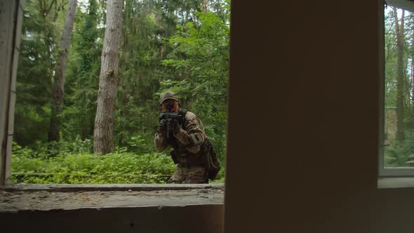 View From Inside Building of Special Assault Squad Move Along Windows