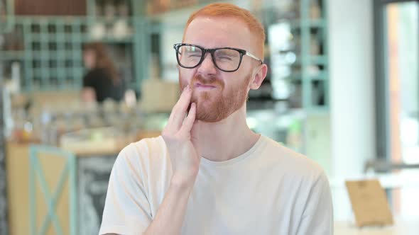 Portrait of Sick Redhead Man with Toothache 