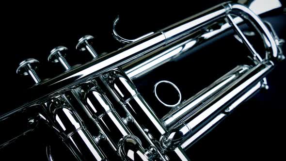 Trumpet Silver Instrument On Black Moving Shot