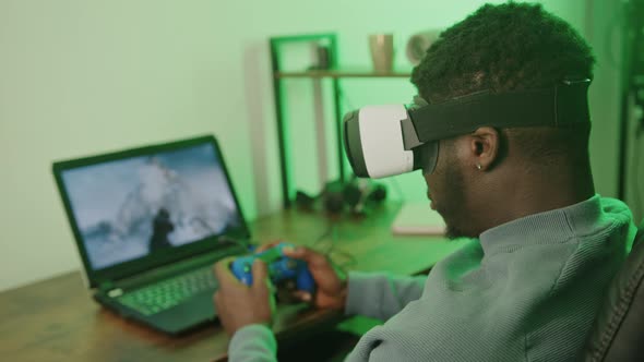 Black Man Gaming with VR Headset Blur  Closeup Shot