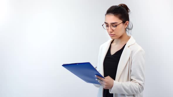 Focused Business Woman Signing Contract Holding Folder Isolated