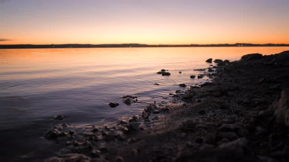 Beautiful Sunset Light Reflection in the Calm Water of Torrevieja Pink Lake in Alicante Spain