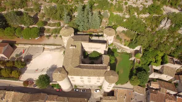 Aerial travel drone view of Balazuc, Southern France.