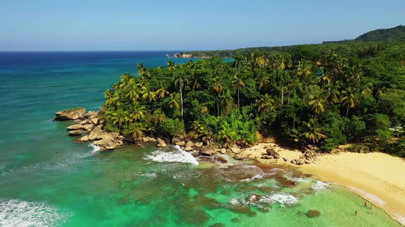 Aerial forward over beach of Nagua, Dominican Republic