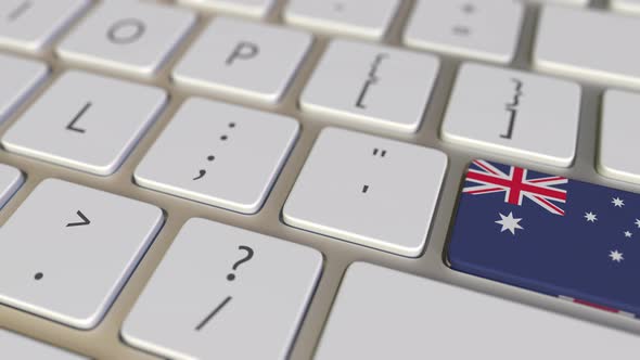 Key with Flag of Australia Switches To Key with Flag of the UK