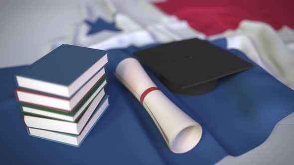 Graduation Cap and Diploma on the Flag of Panama