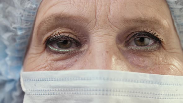 Eyes of Female Doctor in Face Mask