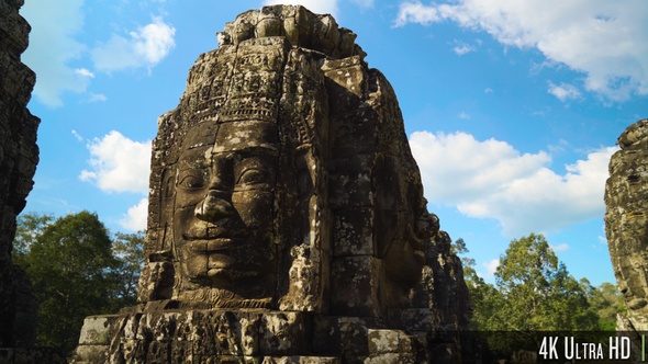 4K Ancient Stone Faces of Bayon Temple inside of Angkor Thom in Siem Reap, Cambodia