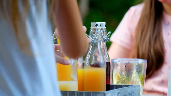 Childrens summer party.summer drink. Fruit juices and smoothies in glass bottles set.