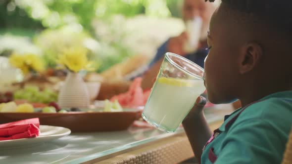 African American boy spending time in garden