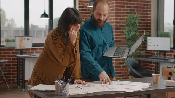 Colleagues Preparing for Business Meeting to Plan Project