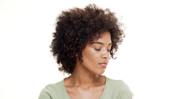 Displeased Young Beautiful African Girl Over White Background