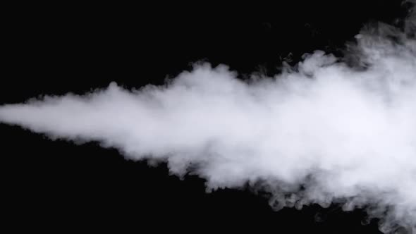 Water Vapor. White Jet of Vapour Steam on Black Background. Slow Motion