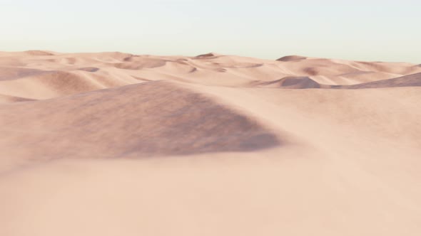 Fast flight over the dunes and desert sands.