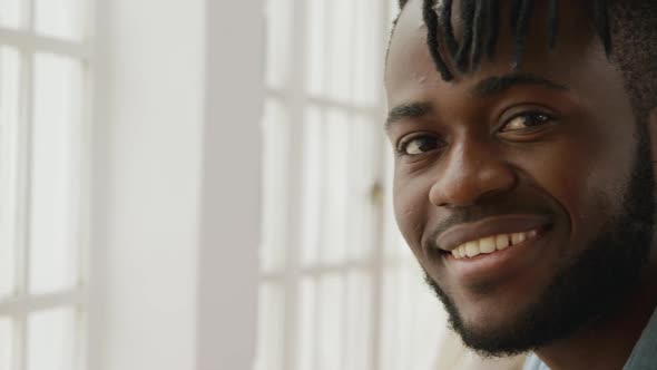 Portrait of a man at home smiling