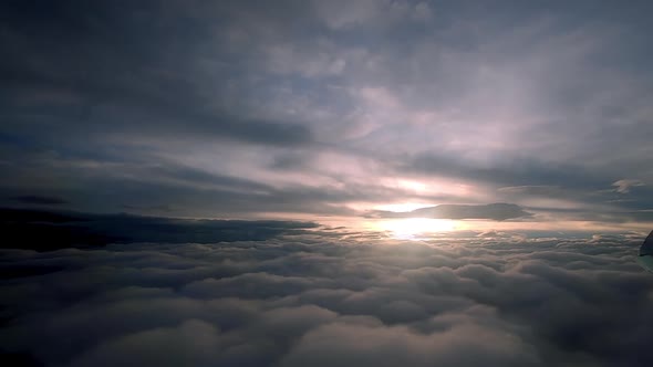 Looking at the clouds and Da Nang city in the airplane in Asia.