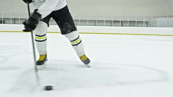 Hockey Player Dribbling Puck