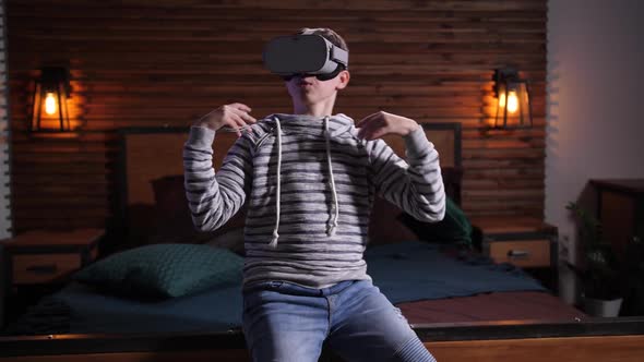 Teenage Boy Playing RPG in Virtual Reality