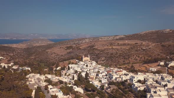 Slow Aerial Drone Punch In Shot over the Agricultural Village of Lefkes Greece