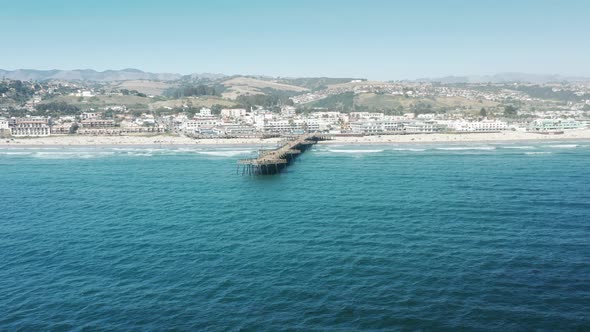 Cinematic Ocean Pier in Pismo Beach in Sunny Southern California USA  Aerial