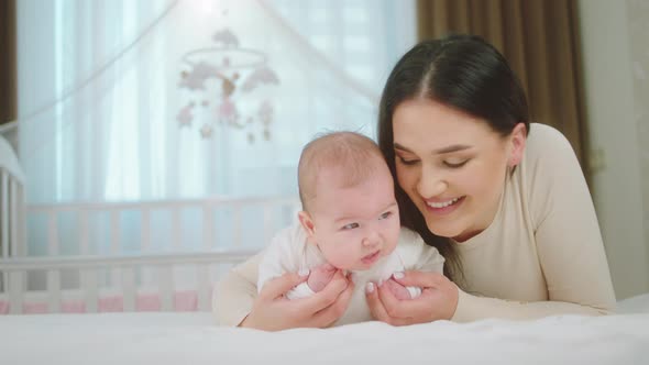 Portrait in Front of the Camera of a Cute Baby