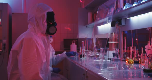 Scientist Using Transparent Display in Laboratory