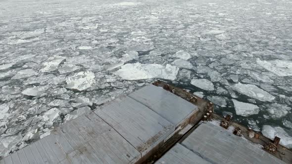 Aerial flight over a frozen lake 4