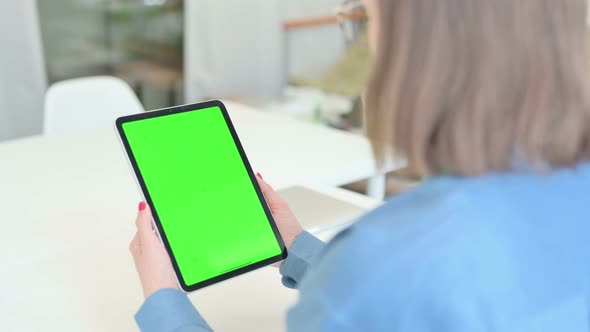 Woman Holding Tablet with Green Chroma Screen