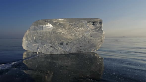 Piece of Ice on Lake Baikal at Sunset